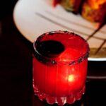 Red drink on a glass