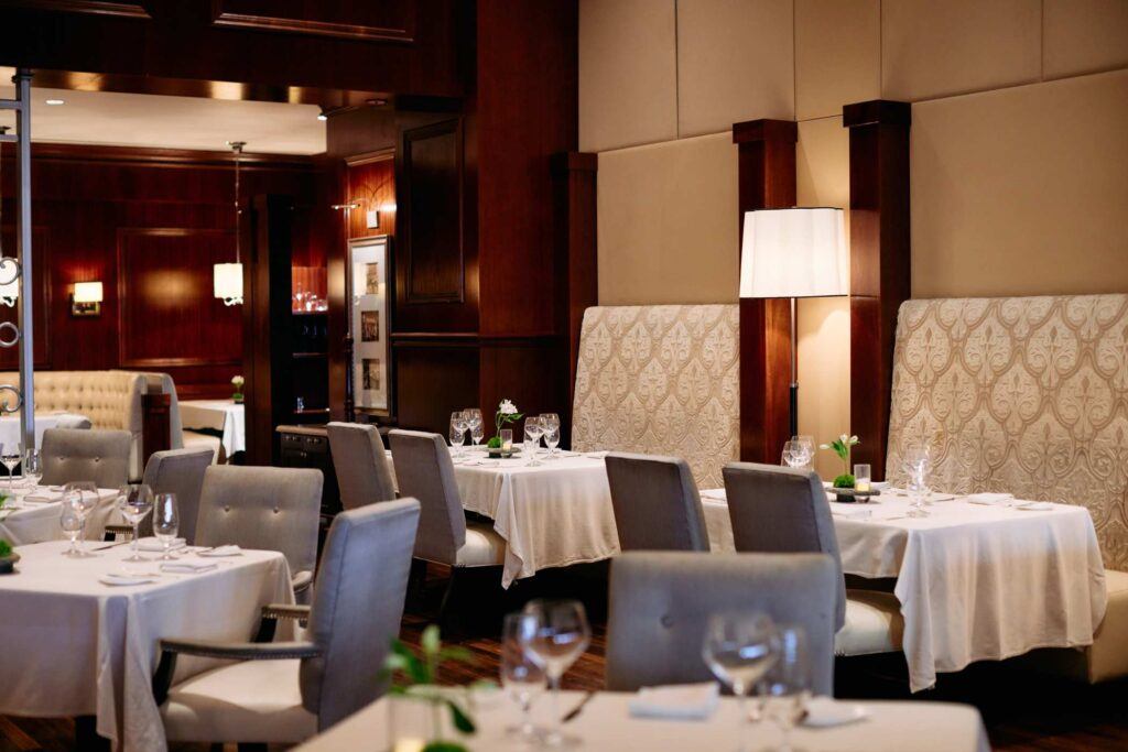 empty restaurant with tables set for service